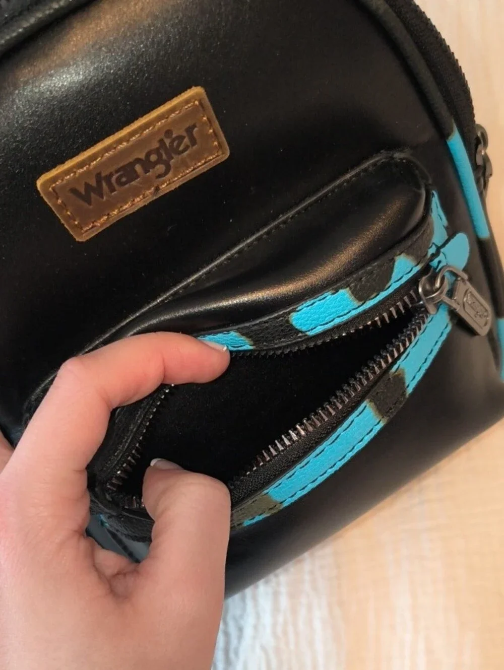 Wrangler Black and Turquoise Mini Backpack with Accent Straps